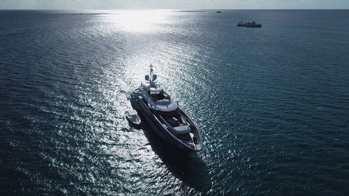 High angle view of boat sailing in sea