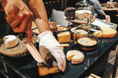 Cropped image of hands making dessert