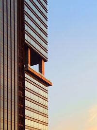 Low angle view of modern building against clear sky