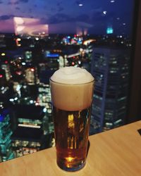 Close-up of beer glass on table