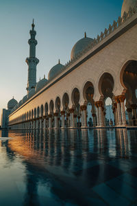 Low angle view of mosque against sky