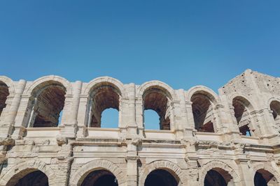 Low angle view of historical building against clear sky