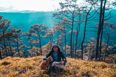 Man with dog in the background