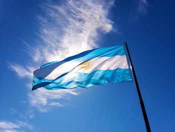 Low angle view of flag against sky