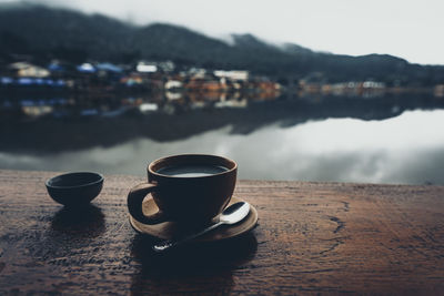 Close-up of coffee cup on table