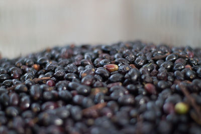 Close-up of coffee beans on table