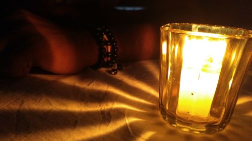 Close-up of illuminated lamp at home