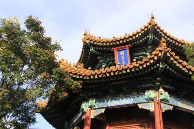 Low angle view of traditional building against sky