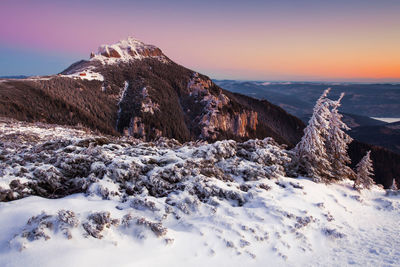 Scenic view of mountain at sunrise