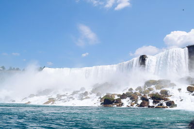 View of waterfall against sky