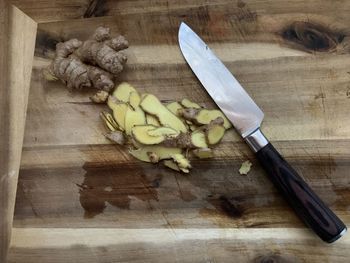 High angle view of chopped bread on cutting board