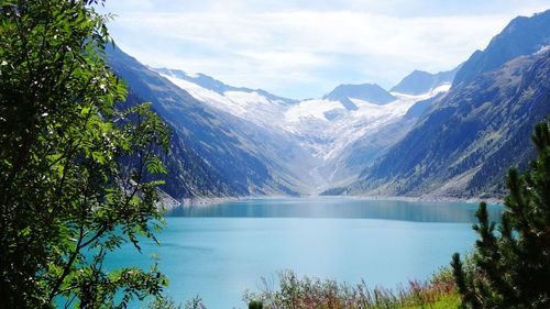 Scenic view of lake with mountains in background