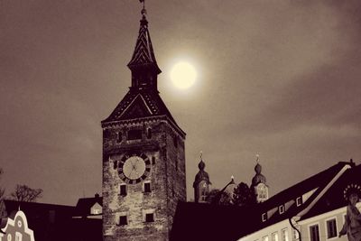 Low angle view of historic church against sky