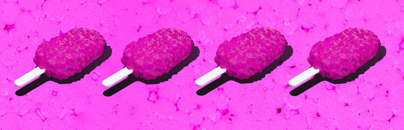 Close-up of pink petals on white background