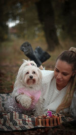 Portrait of woman with dog