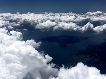 Scenic view of mountains against cloudy sky