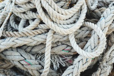 Full frame shot of rope tied to bollard