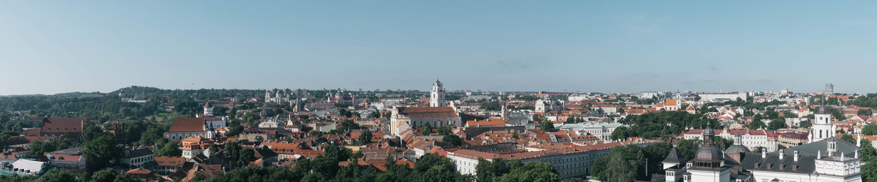 Panoramic view of town against sky