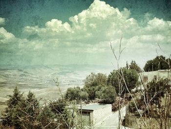 Scenic view of sea against cloudy sky