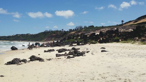 Tourist walking on beach