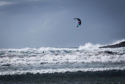 People flying over beach