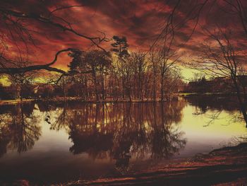 Scenic view of lake at sunset