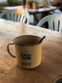 Close-up of coffee cup on table