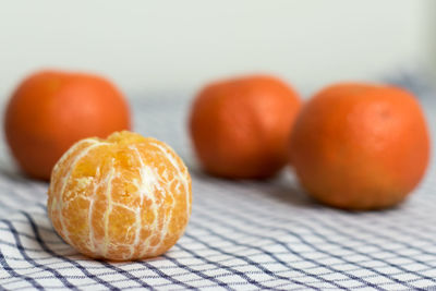 Close-up of orange fruits on table