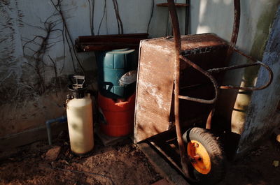 Abandoned gardening equipment in back yard
