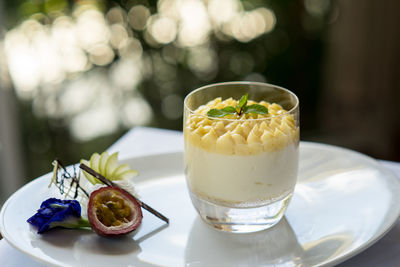 Close-up of ice cream in glass on table