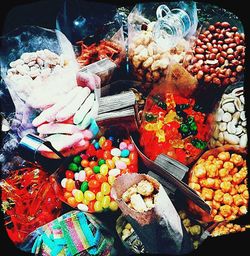 High angle view of multi colored vegetables for sale at market stall