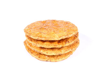 Close-up of bread against white background