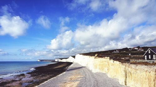 Scenic view of sea against cloudy sky