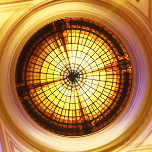 Low angle view of illuminated ceiling