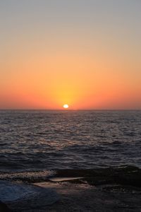 Scenic view of sea during sunset