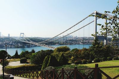 Suspension bridge over river