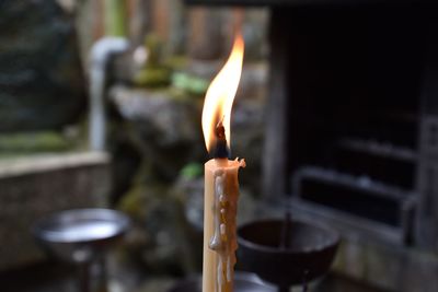 Close-up of burning candle