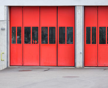 Red closed door of building