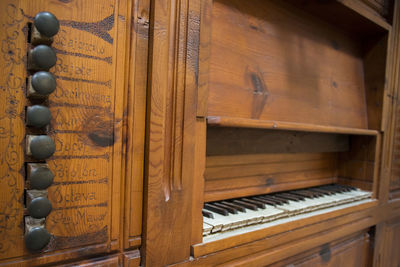 Close-up of piano keys on wooden floor