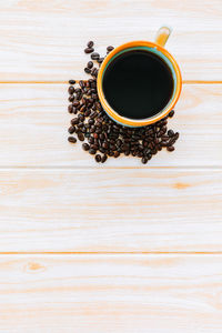 High angle view of coffee cup on table