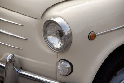 Close-up of vintage car headlight