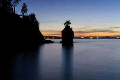 Scenic view of sea at dusk