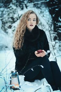 Portrait of woman in snow