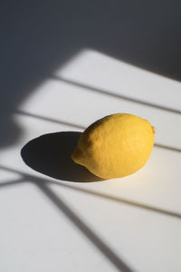 Close-up of lemon on table