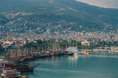 High angle view of townscape by sea