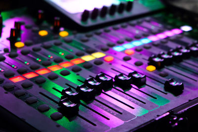 Closeup of an audio mixing control panel