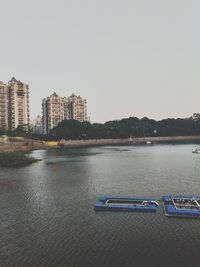 Scenic view of city against clear sky