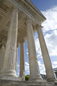 Low angle view of historical building, square house in nîmes, france