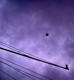 Low angle view of street light against sky