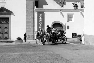 Man riding bicycle on street